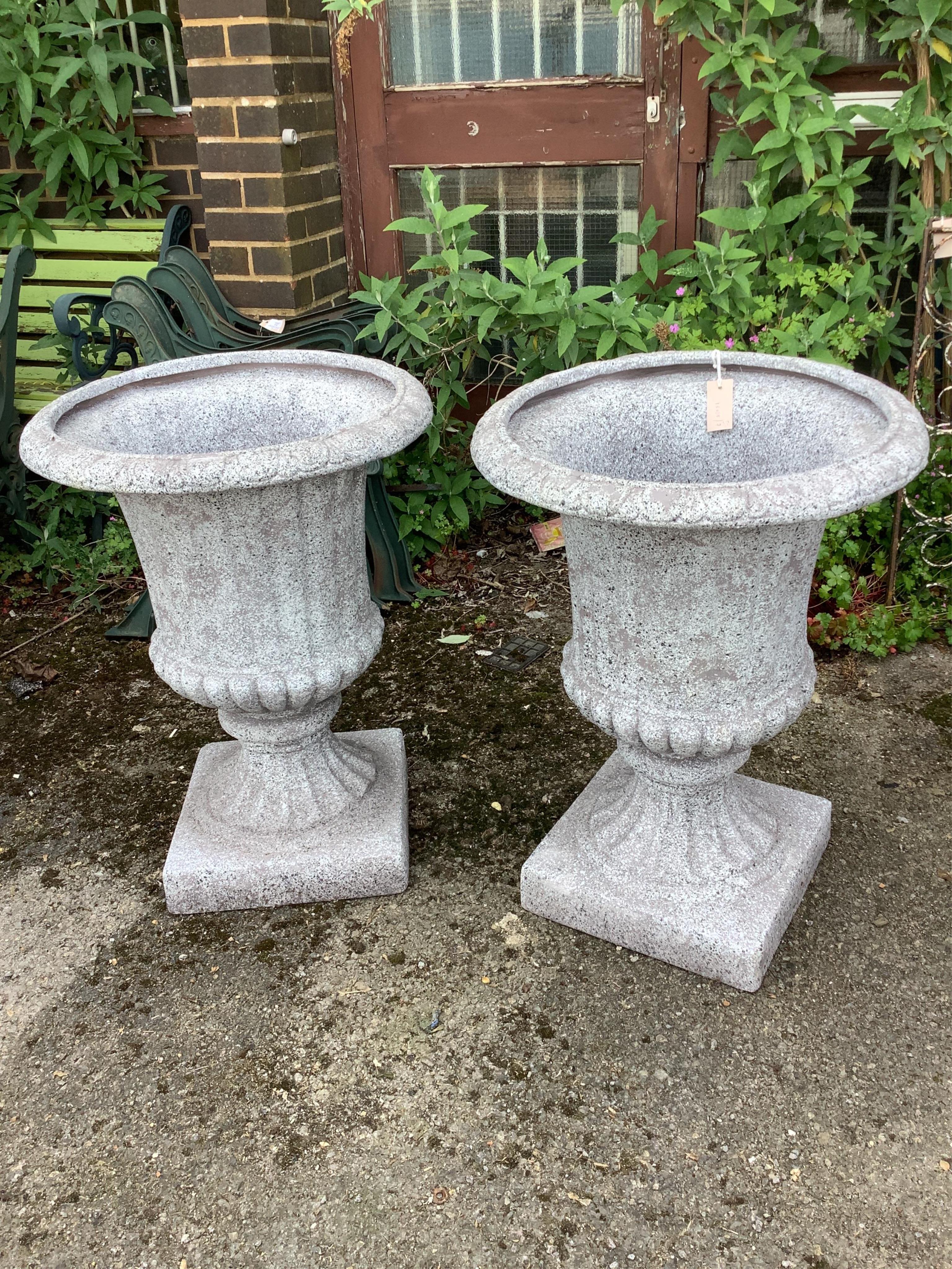 A pair of circular Fibreclay campana garden urns, diameter 54cm, height 72cm